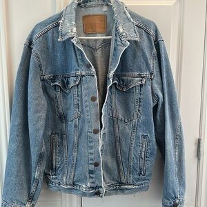 Levi’s Classic Blue Denim Jacket - distressed denim jacket